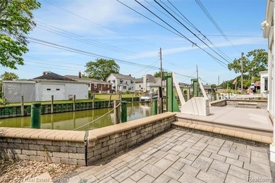 Welcome home to this updated, canal-front, brick ranch, with - photo 40