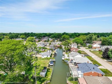 Welcome home to this updated, canal-front, brick ranch, with - photo 41