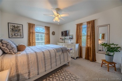 Welcome to this 4-bedroom, 3-bath lake-area-retreat with - photo 19