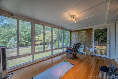 Welcome to this 4-bedroom, 3-bath lake-area-retreat with - photo 23