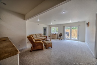 Welcome to this 4-bedroom, 3-bath lake-area-retreat with - photo 27