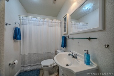 Welcome to this 4-bedroom, 3-bath lake-area-retreat with - photo 33