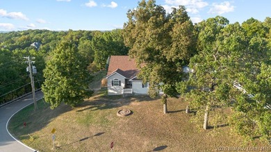 Welcome to this 4-bedroom, 3-bath lake-area-retreat with - photo 35