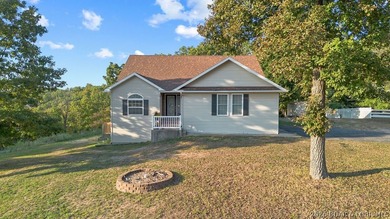Welcome to this 4-bedroom, 3-bath lake-area-retreat with - photo 36