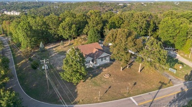 Welcome to this 4-bedroom, 3-bath lake-area-retreat with - photo 42