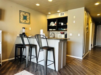 This condo is priced to sell and ready for your next - photo 4