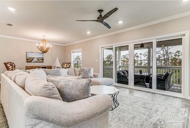 This beautifully furnished coastal residence is located in the - photo 8