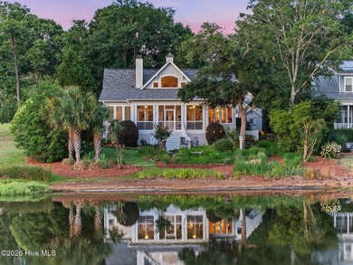 Positioned along the shores of a spring-fed lake in the coveted - photo 3