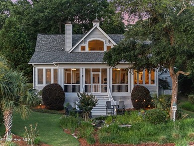 Positioned along the shores of a spring-fed lake in the coveted - photo 4