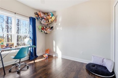 Beautiful brick front 4 bedroom, 4 full bathroom home featuring