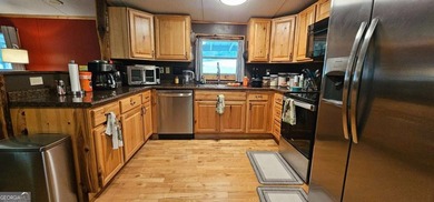 Tucked away at 567 Dale Trail in Menlo, GA, this isn't just a - photo 16
