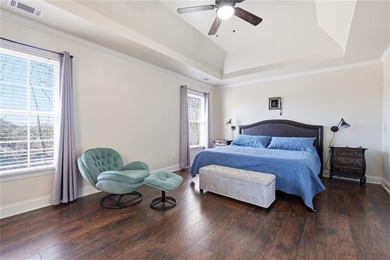 Beautiful brick front 4 bedroom, 4 full bathroom home featuring