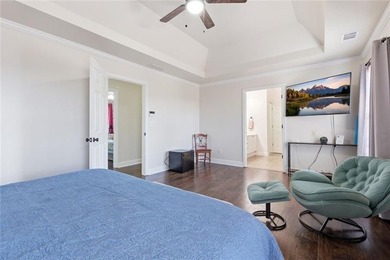 Beautiful brick front 4 bedroom, 4 full bathroom home featuring