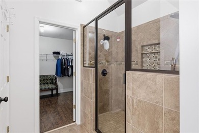 Beautiful brick front 4 bedroom, 4 full bathroom home featuring