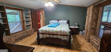 Tucked away at 567 Dale Trail in Menlo, GA, this isn't just a - photo 22