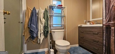Tucked away at 567 Dale Trail in Menlo, GA, this isn't just a - photo 23