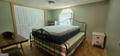 Tucked away at 567 Dale Trail in Menlo, GA, this isn't just a - photo 26