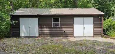 Tucked away at 567 Dale Trail in Menlo, GA, this isn't just a - photo 27