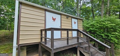 Tucked away at 567 Dale Trail in Menlo, GA, this isn't just a - photo 29