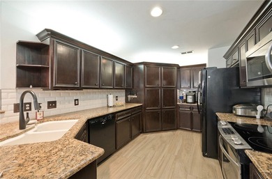 Step into this versatile 3-bedroom, 2-bath home in the highly - photo 5