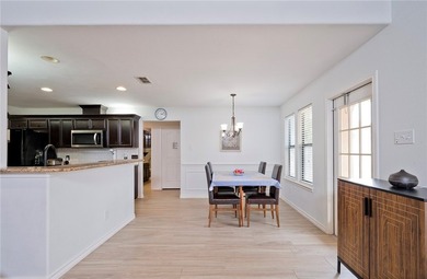Step into this versatile 3-bedroom, 2-bath home in the highly - photo 7