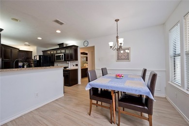 Step into this versatile 3-bedroom, 2-bath home in the highly - photo 8
