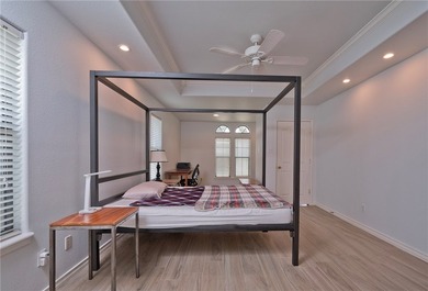 Step into this versatile 3-bedroom, 2-bath home in the highly - photo 9