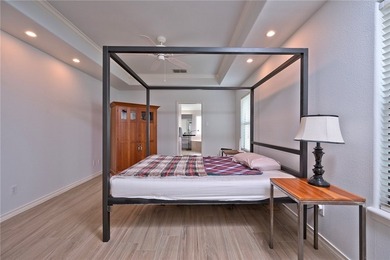 Step into this versatile 3-bedroom, 2-bath home in the highly - photo 10