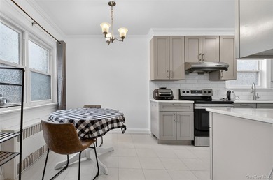 Prime Flushing location! Well-maintained legal 2-family home - photo 8