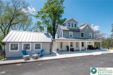 Tucked away on nearly 42 SCENIC ACRES this CHARMING FARMHOUSE - photo 4
