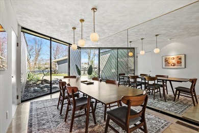 4010 Clubhouse Drive: Where Architectural Light Meets Lakeside - photo 11