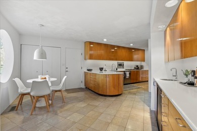 4010 Clubhouse Drive: Where Architectural Light Meets Lakeside - photo 29