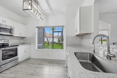 Beautifully updated 3-bedroom, 2-bath corner villa with 1,495 sq - photo 11