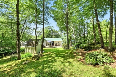 Year-Round Waterfront Cottage on Worthley Pond Tucked along the - photo 15