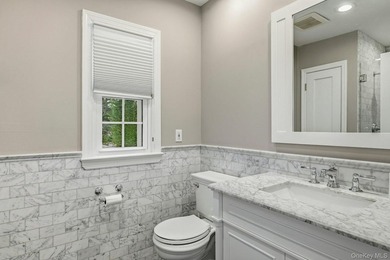 Located in the Village of Flower Hill, 38 Hewlett Lane is a - photo 18