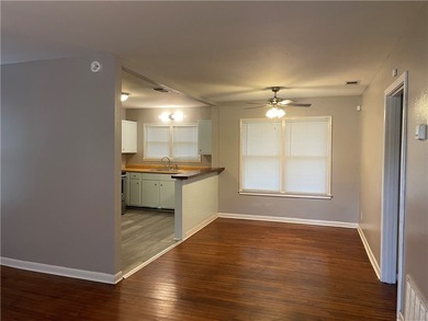 Charming and centrally located, 4426 Wesley Dr offers a - photo 2