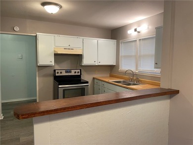 Charming and centrally located, 4426 Wesley Dr offers a - photo 5