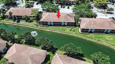 Lake Condo For Sale in Palm Beach Gardens, Florida