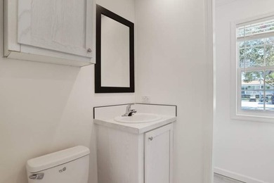 This cozy manufactured home in Tropical Haven offers 2 bedrooms - photo 12