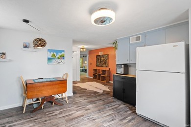 Tucked into a peaceful setting with mature trees and open green - photo 15