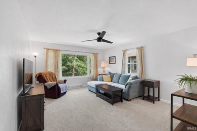 Tucked into a peaceful setting with mature trees and open green - photo 16