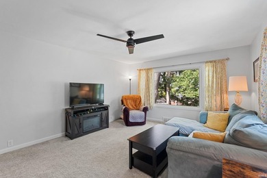 Tucked into a peaceful setting with mature trees and open green - photo 17