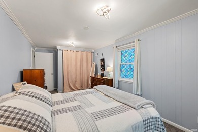 Tucked into a peaceful setting with mature trees and open green - photo 21