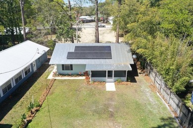 This fully renovated 2-bedroom, 2-bath ground-level home in - photo 22
