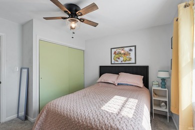 Tucked into a peaceful setting with mature trees and open green - photo 26