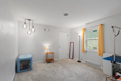 Tucked into a peaceful setting with mature trees and open green - photo 27