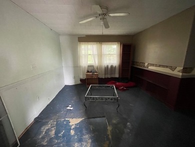 POTENTIAL! This property needs some TLC but has recently had - photo 11