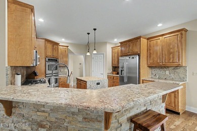 This seasonal lakeview home is located at 205 Oonoga Way, in - photo 18