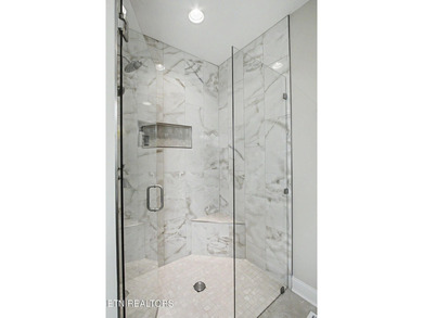 This seasonal lakeview home is located at 205 Oonoga Way, in - photo 26