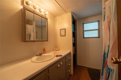 Welcome to your lakeside escape! This cozy, well-maintained - photo 16